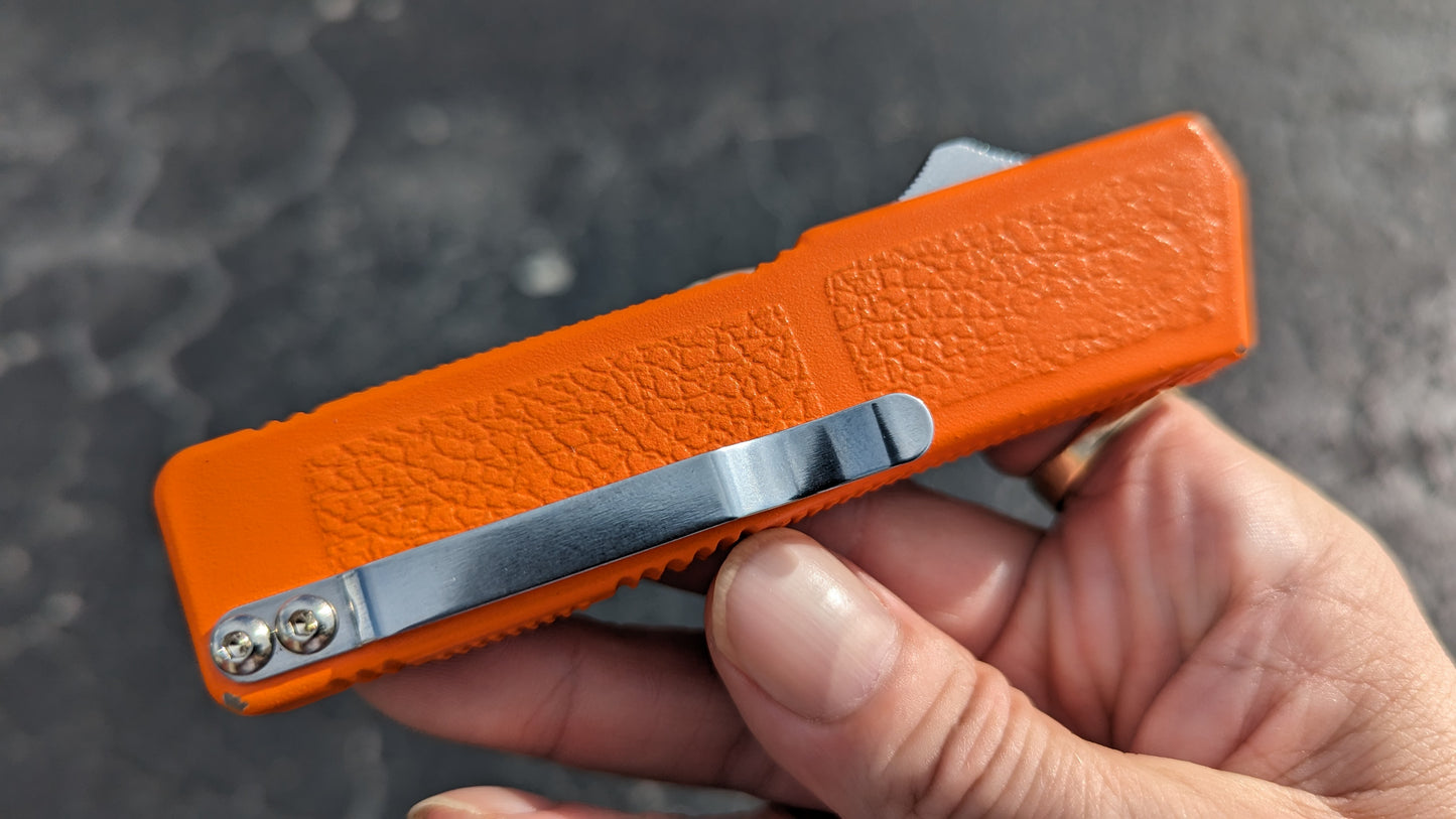 ORANGE LIGHTNING OTF KNIFE PLAIN EDGE DROP POINT BLADE