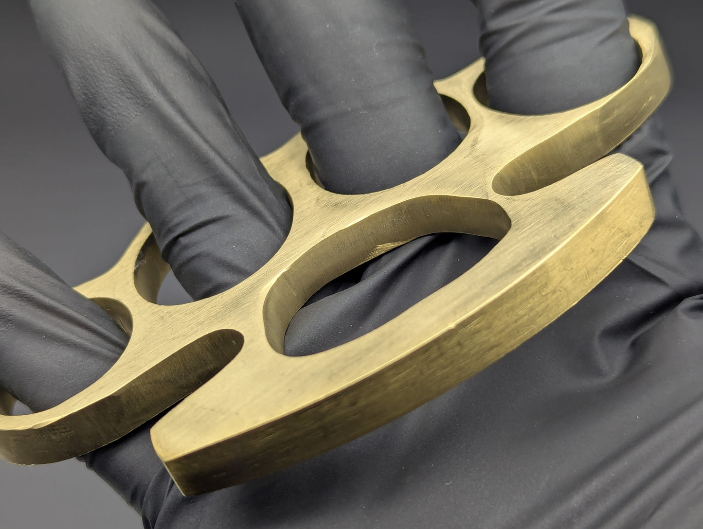 ROUND ABOUT SOLID BRASS STOCK KNUCKLE DUSTER