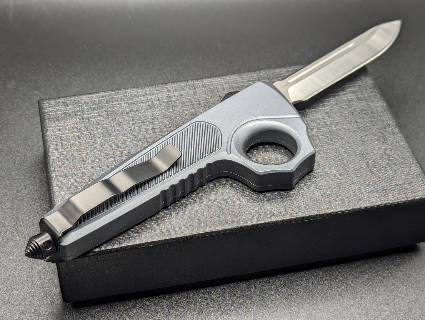 GREY SFK GLASS BREAKER D/A OTF KNIFE DROP POINT