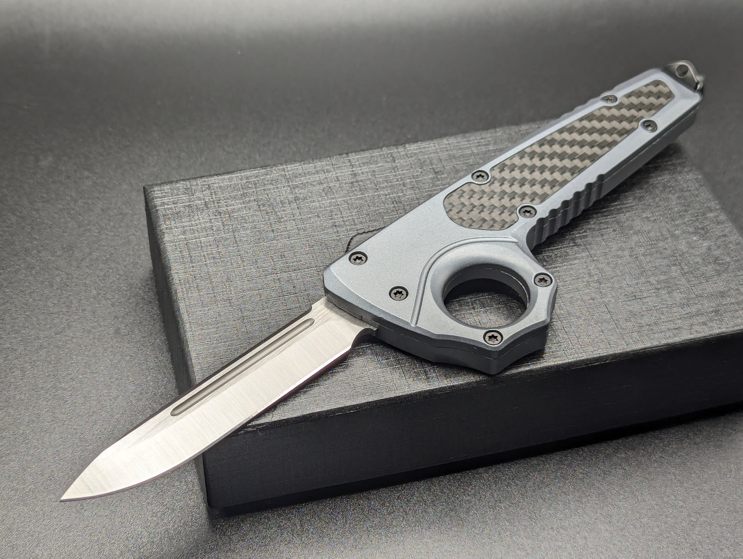 GREY SFK GLASS BREAKER D/A OTF KNIFE DROP POINT