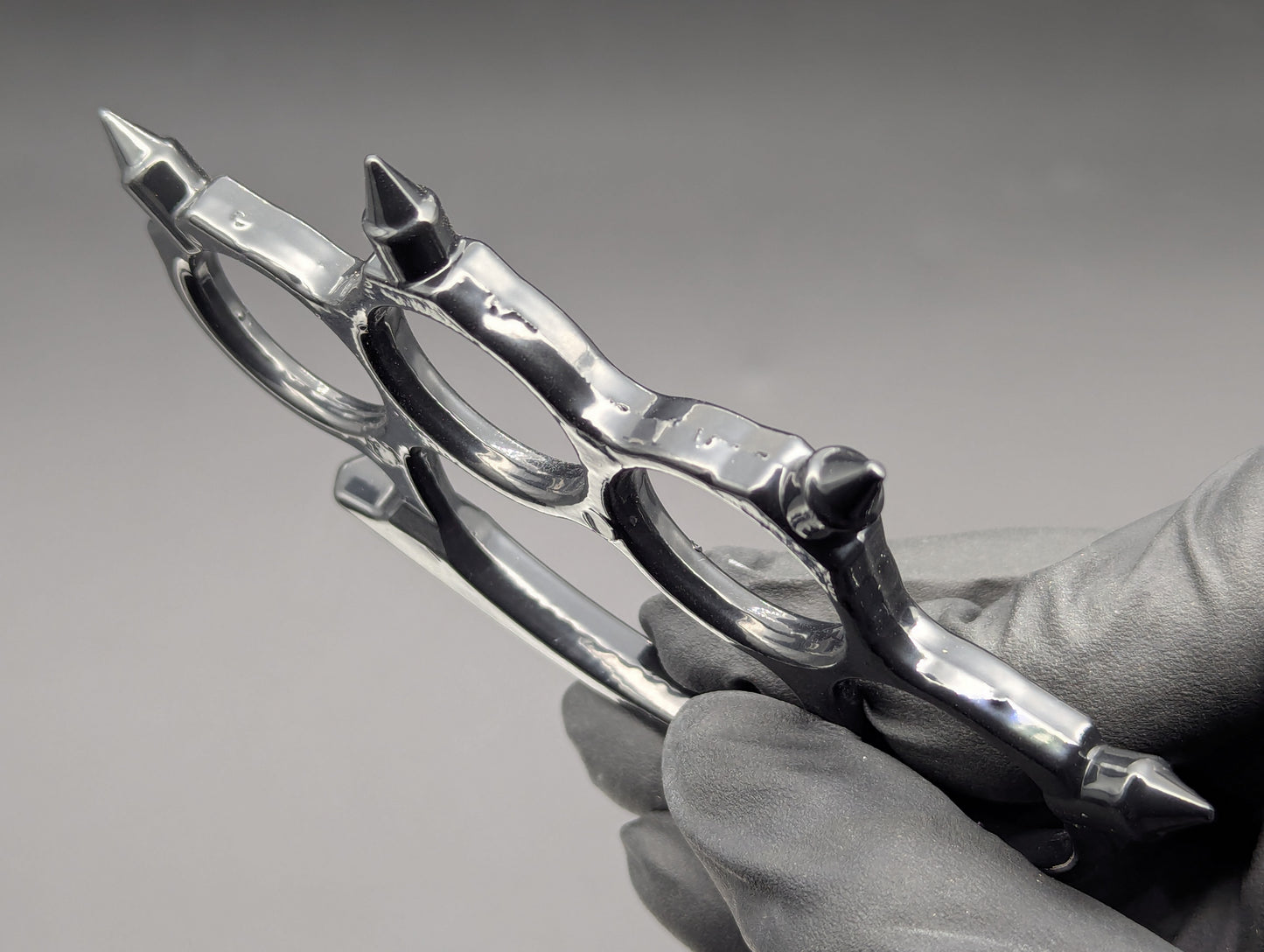 FOUR FINGER SPIKED STEEL KNUCKLE DUSTER BLACK