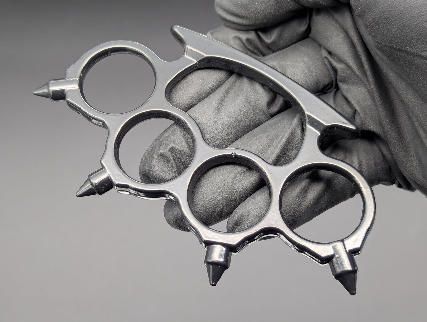 FOUR FINGER SPIKED STEEL KNUCKLE DUSTER BLACK