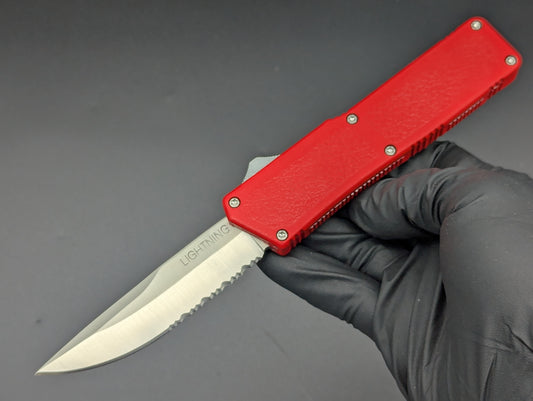 Lightning OTF Knife Red Part Serr. Drop Point