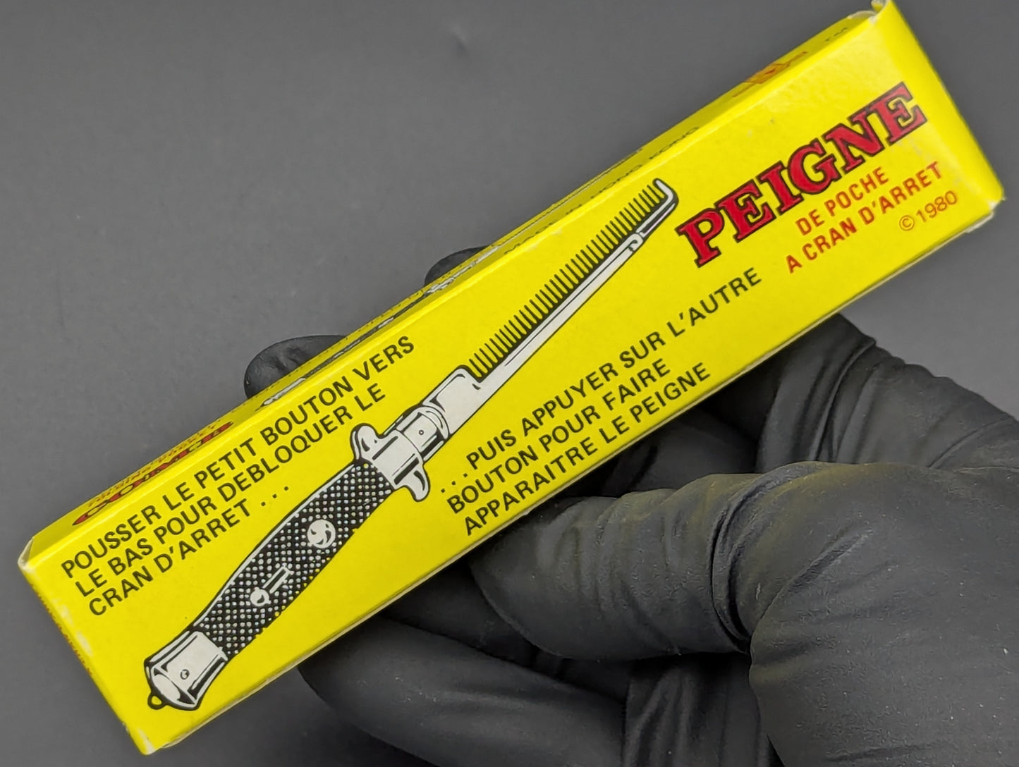 NOS 80's VINTAGE HONG KONG SWITCHBLADE COMB