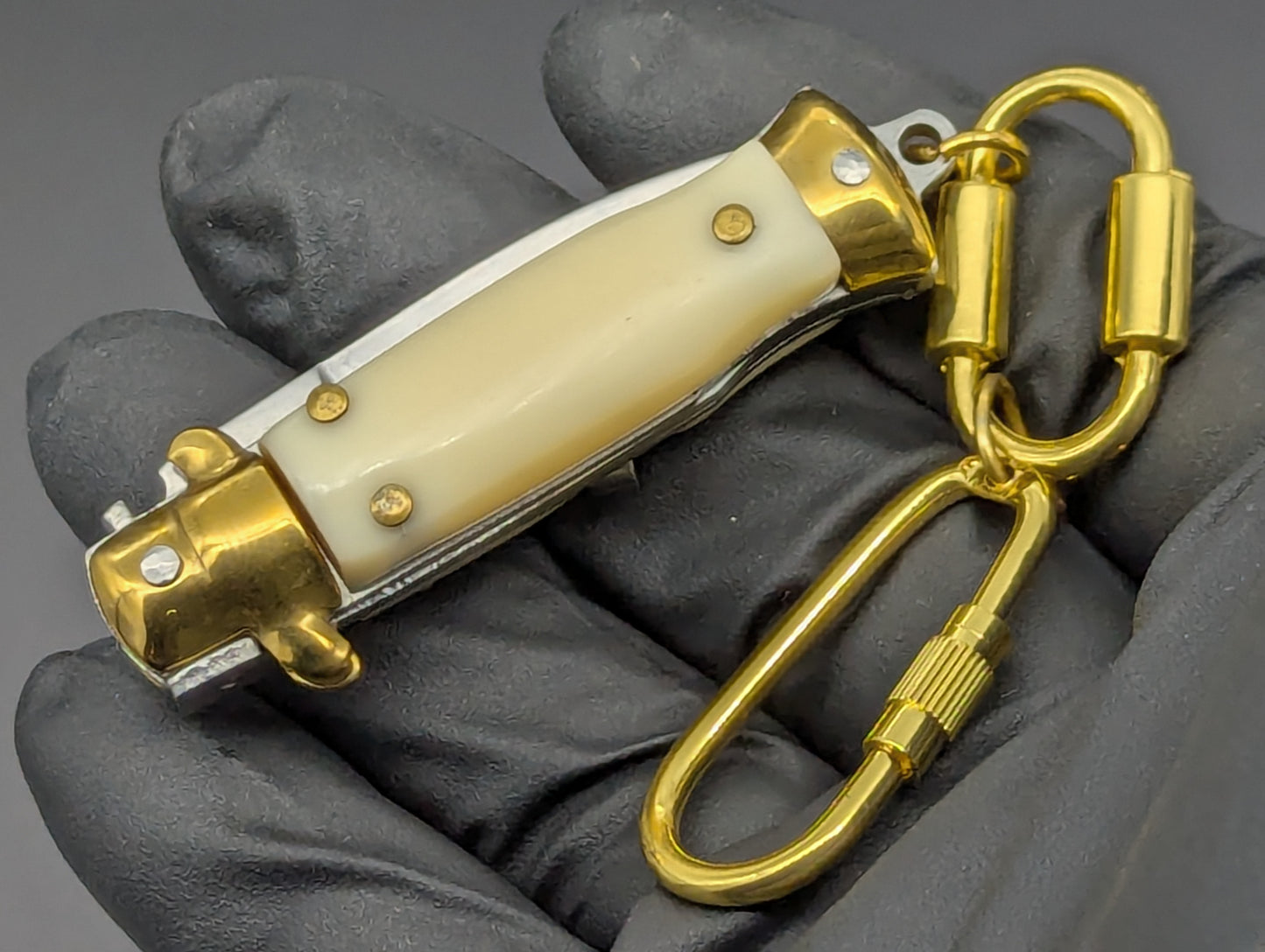 MINI JUMBO FAUX IVORY SWITCHBLADE KEYRING