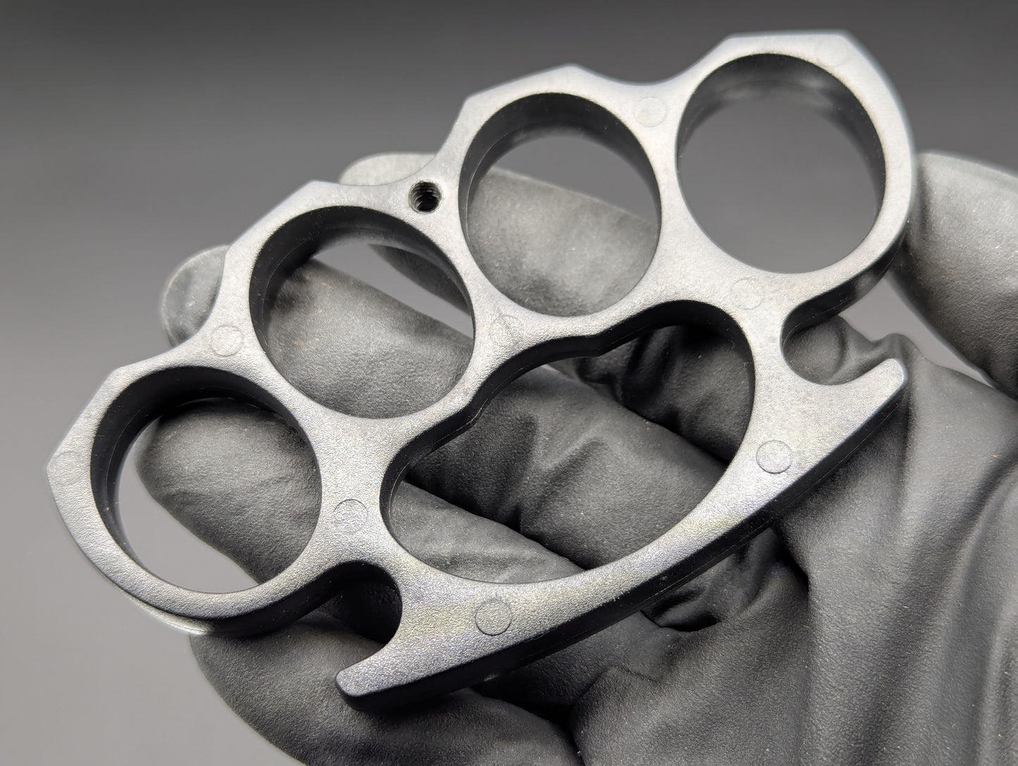 ABS PLASTIC NON PERMISSIVE ENVIRONMENT KNUCKLE DUSTERS BLACK