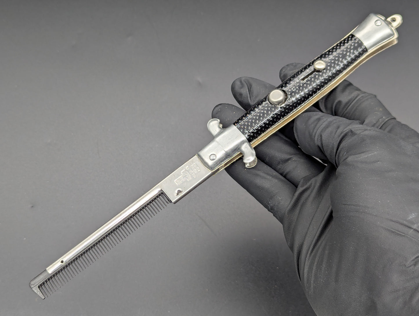 NOS 80's VINTAGE HONG KONG SWITCHBLADE COMB