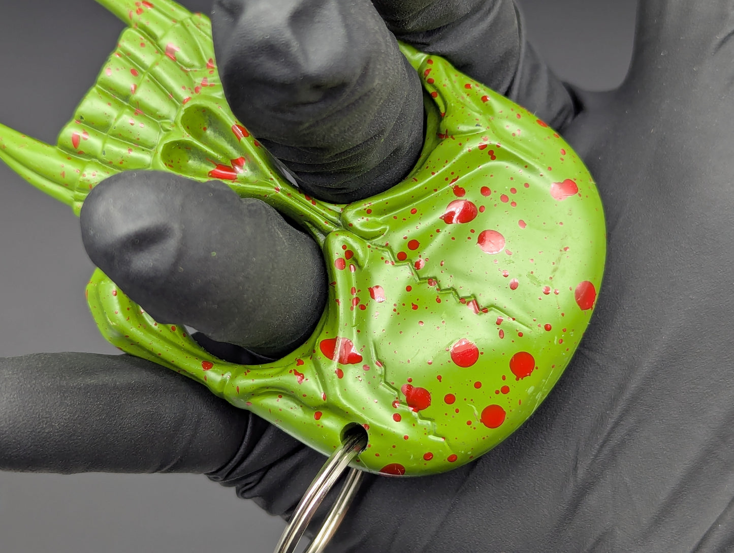 ZOMBIE SKULL SELF DEFENSE KEYRING GREEN RED SPLAT