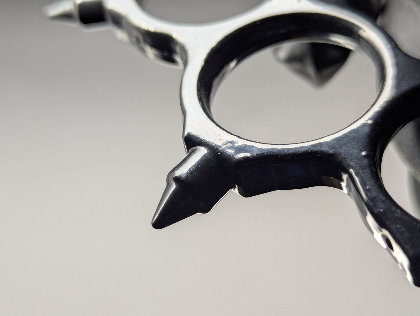 FOUR FINGER SPIKED STEEL KNUCKLE DUSTER BLACK