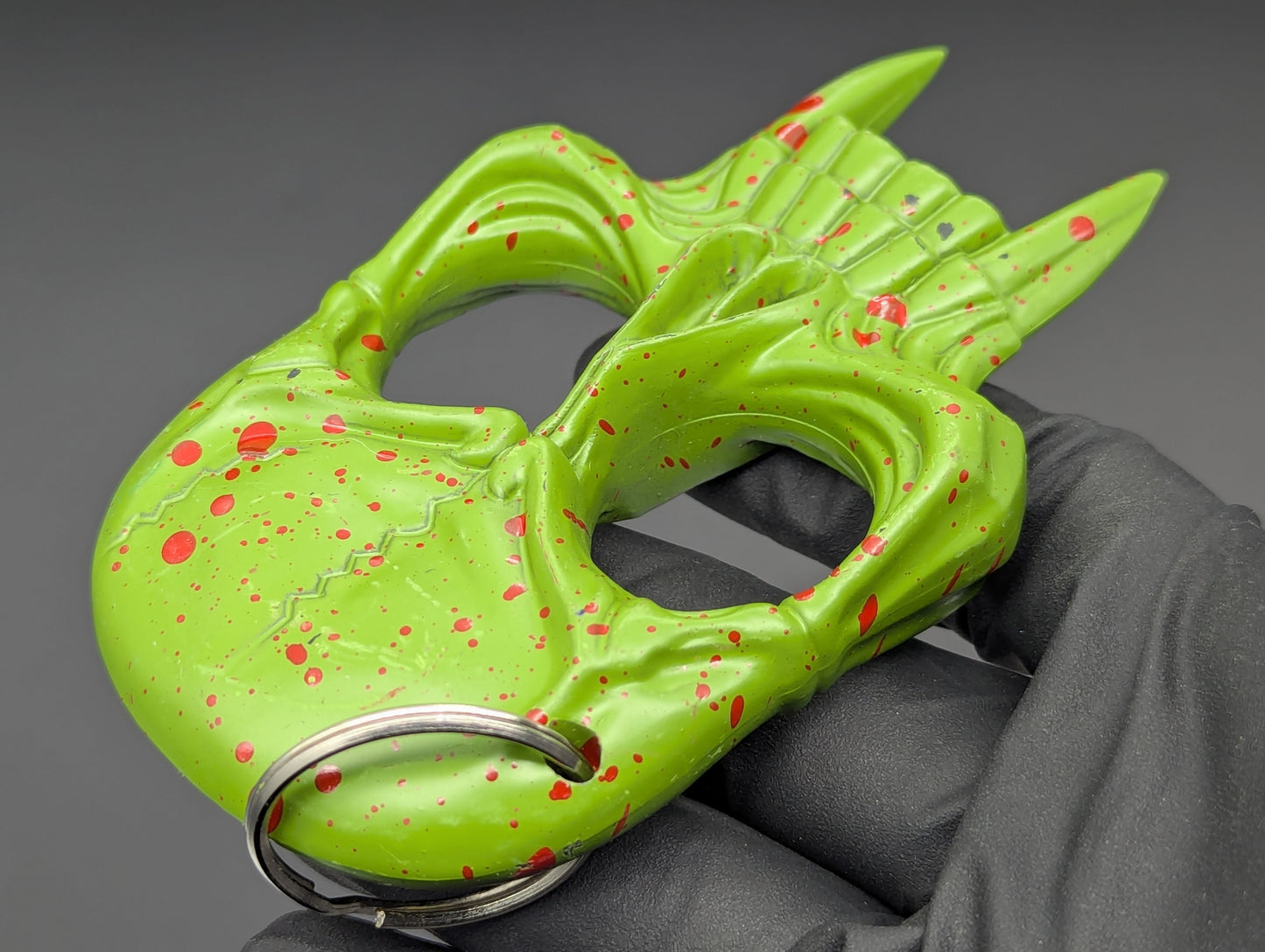ZOMBIE SKULL SELF DEFENSE KEYRING GREEN RED SPLAT