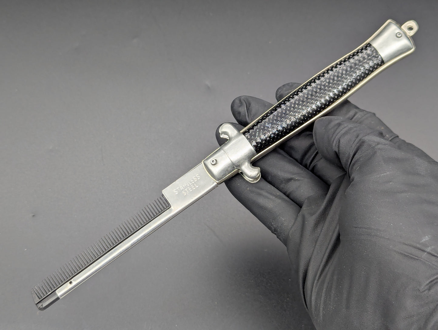 NOS 80's VINTAGE HONG KONG SWITCHBLADE COMB