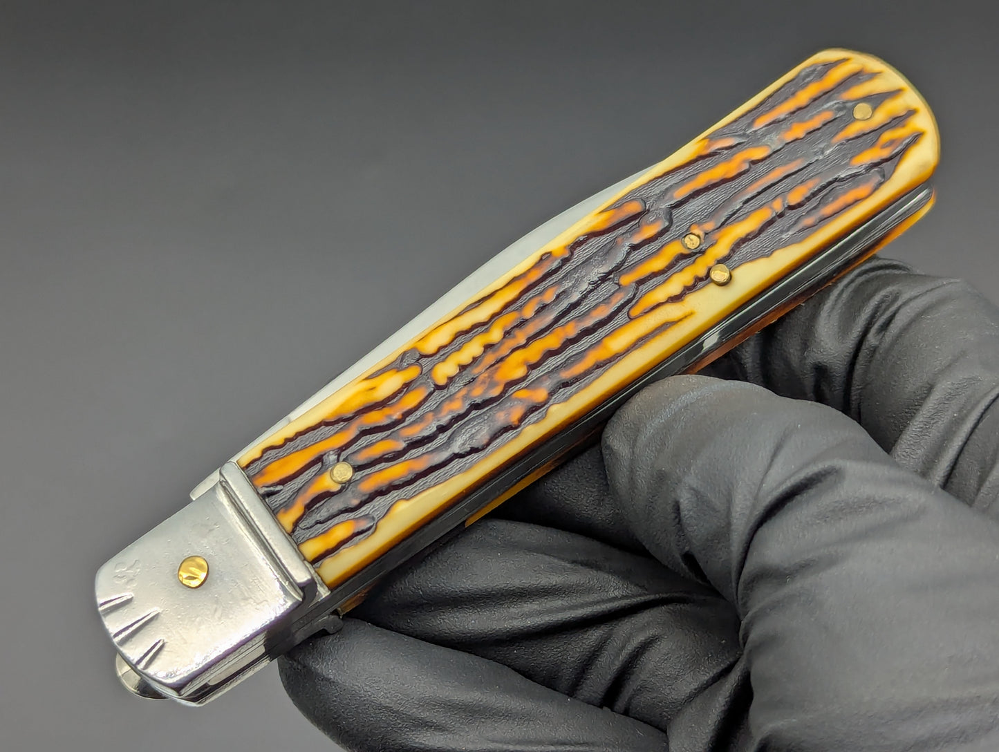 FAUX STAG 7.5" LEVERLOCK SWITCHBLADE KNIFE