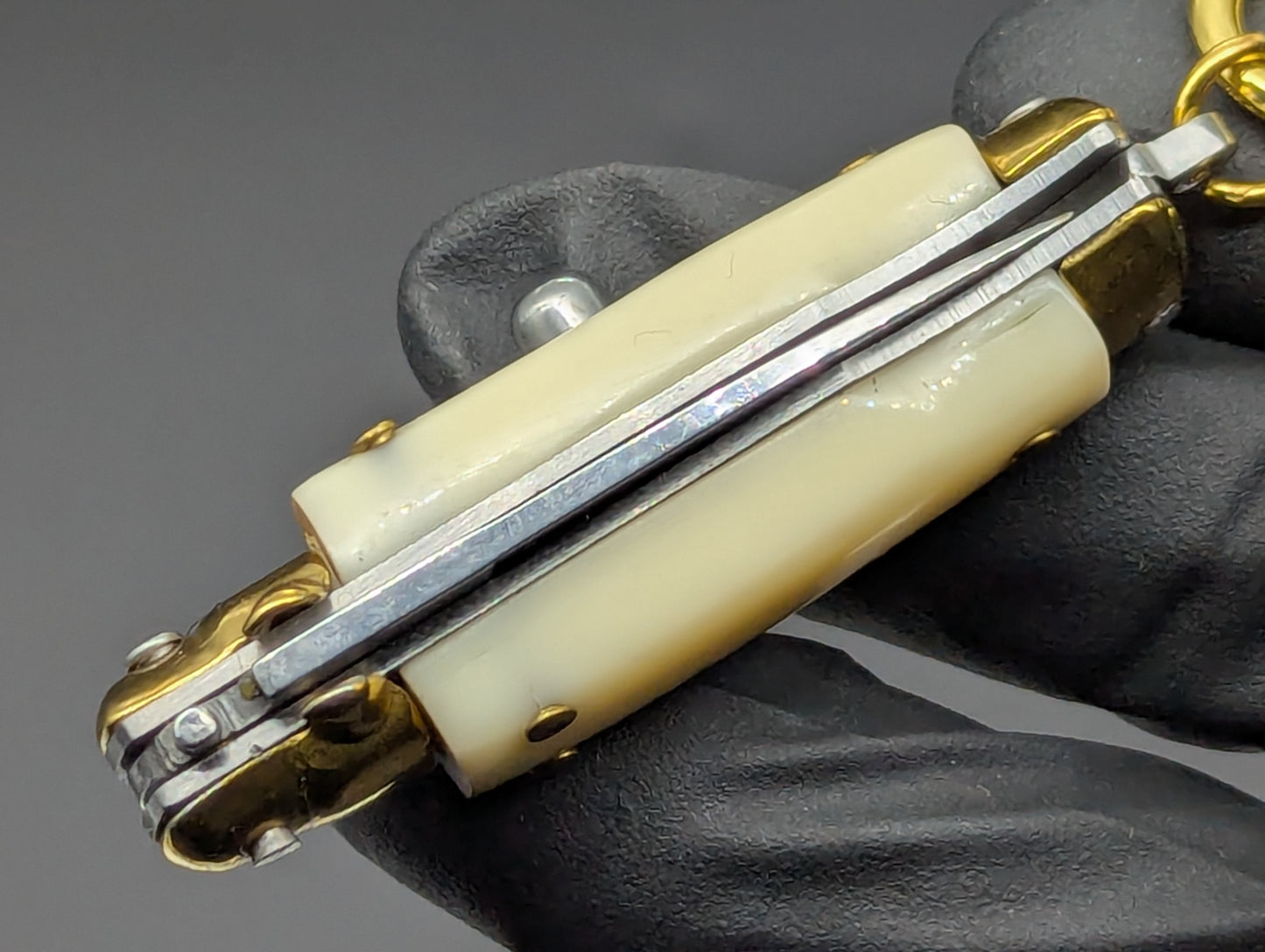 MINI JUMBO FAUX IVORY SWITCHBLADE KEYRING