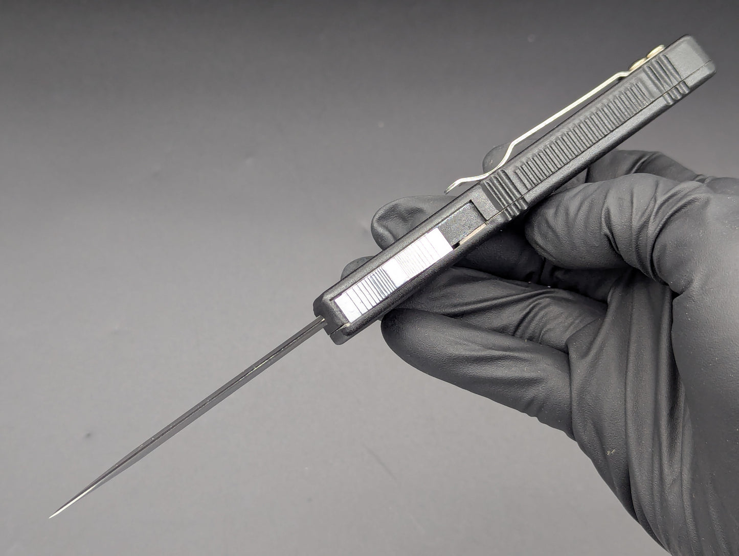 Black Stainless D/E Part Serr. Lightning OTF Knife