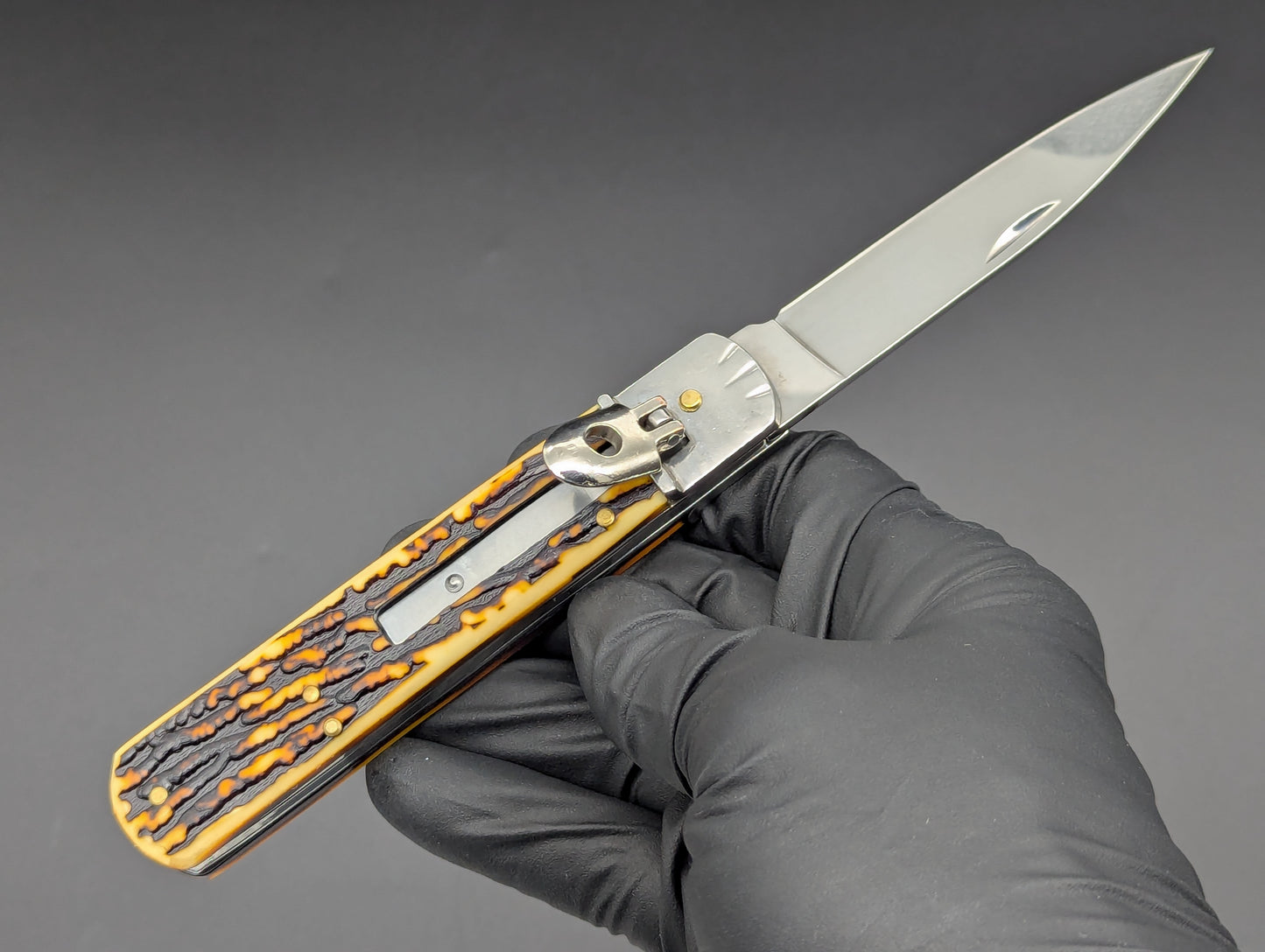 FAUX STAG 7.5" LEVERLOCK SWITCHBLADE KNIFE