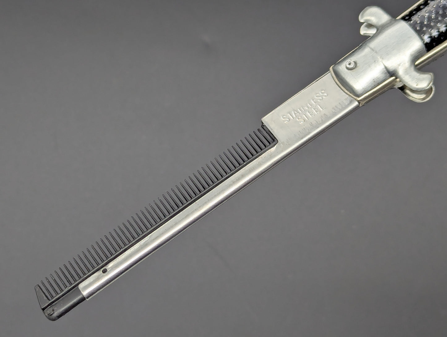 NOS 80's VINTAGE HONG KONG SWITCHBLADE COMB