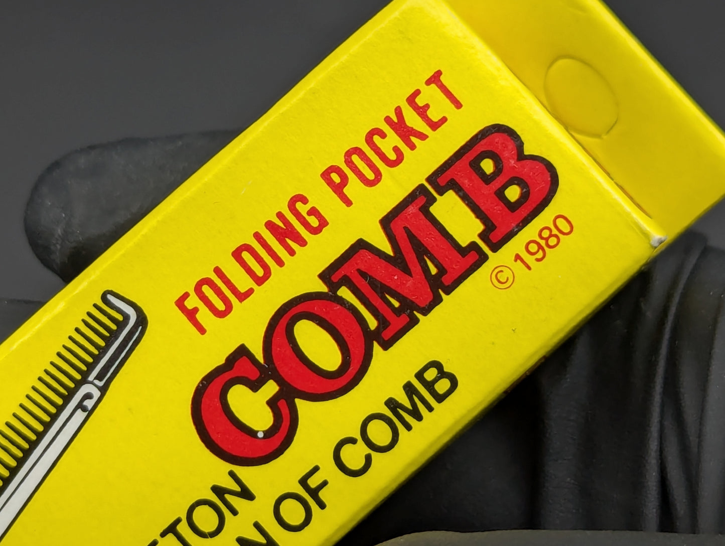 NOS 80's VINTAGE HONG KONG SWITCHBLADE COMB