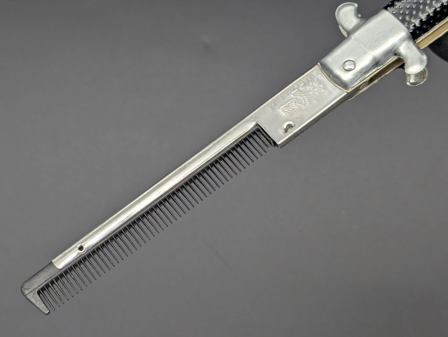 NOS 80's VINTAGE HONG KONG SWITCHBLADE COMB