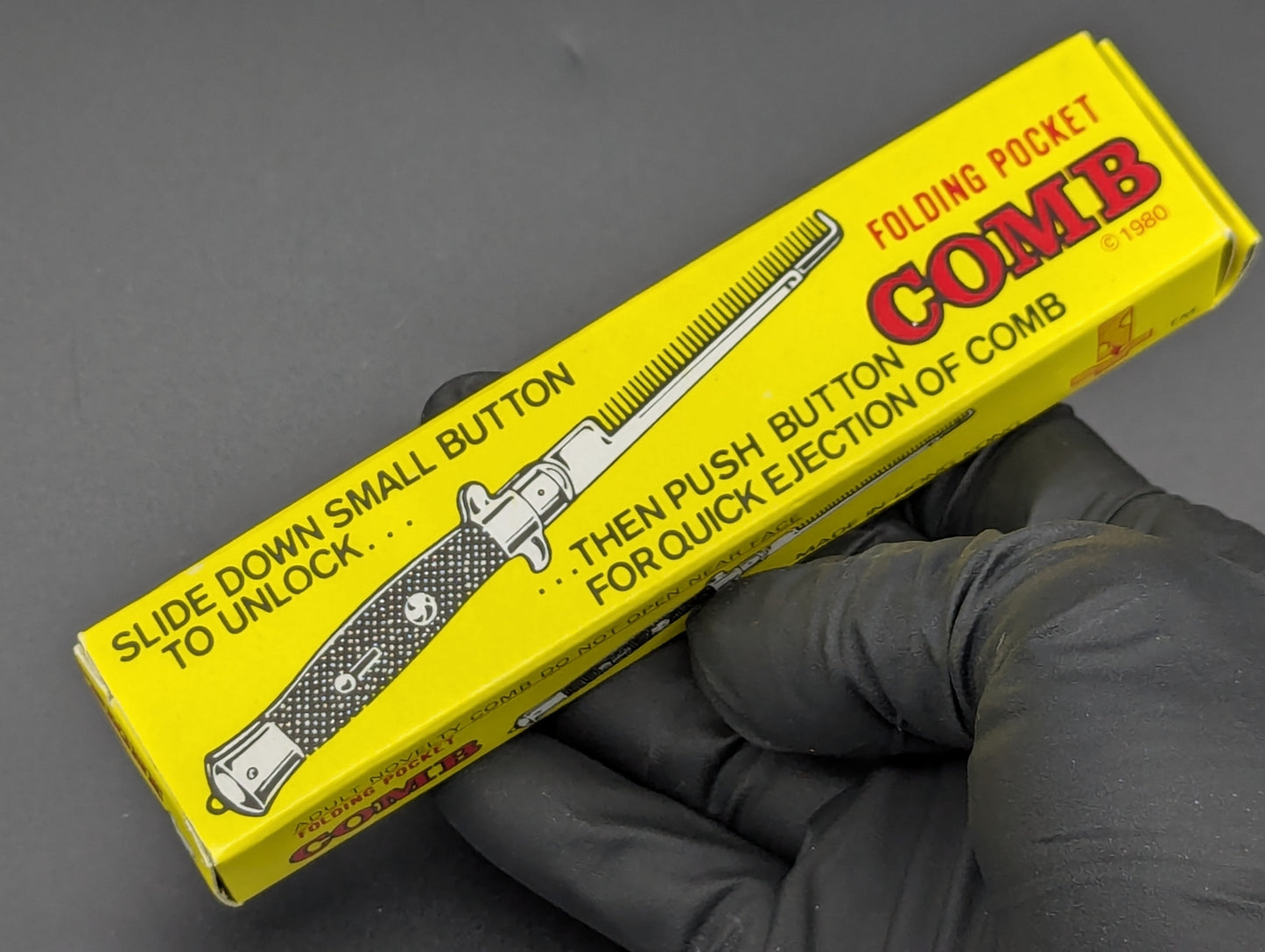 NOS 80's VINTAGE HONG KONG SWITCHBLADE COMB