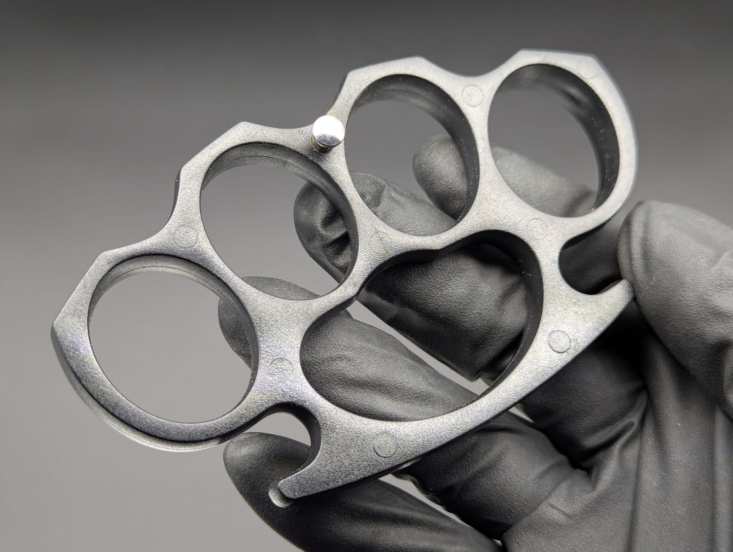 ABS PLASTIC NON PERMISSIVE ENVIRONMENT KNUCKLE DUSTERS BLACK