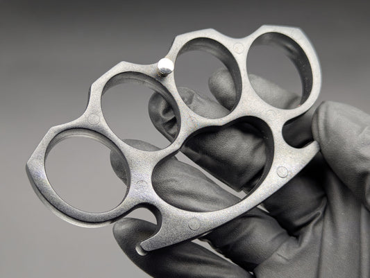 ABS PLASTIC NON PERMISSIVE ENVIRONMENT KNUCKLE DUSTERS BLACK