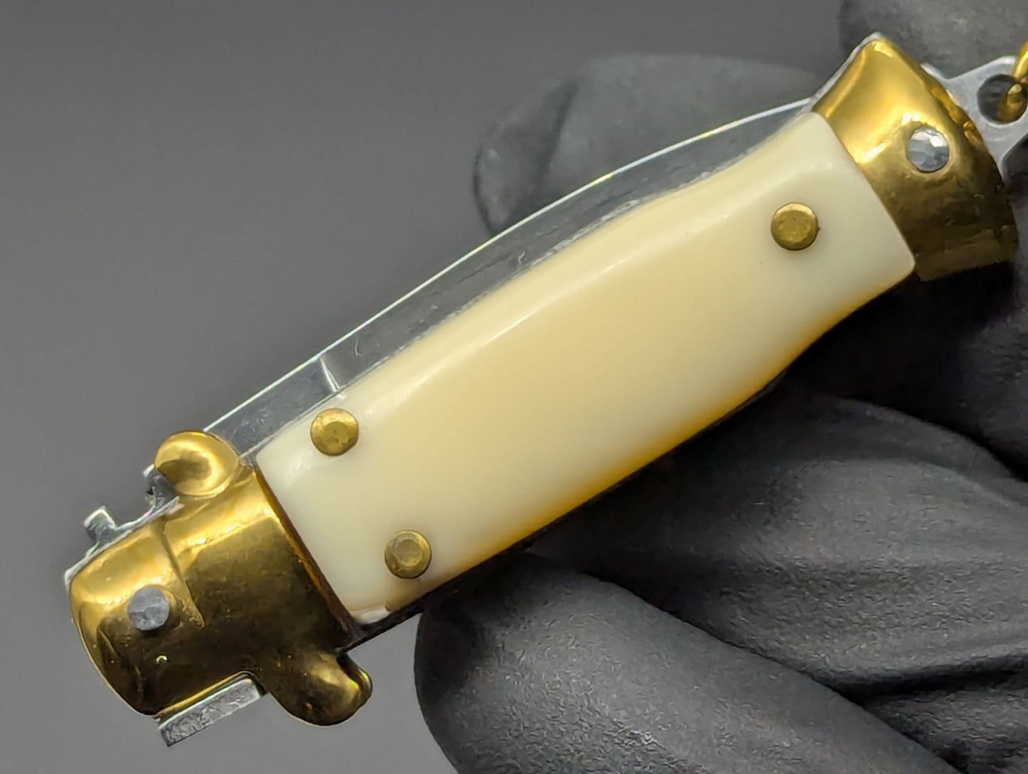 MINI JUMBO FAUX IVORY SWITCHBLADE KEYRING