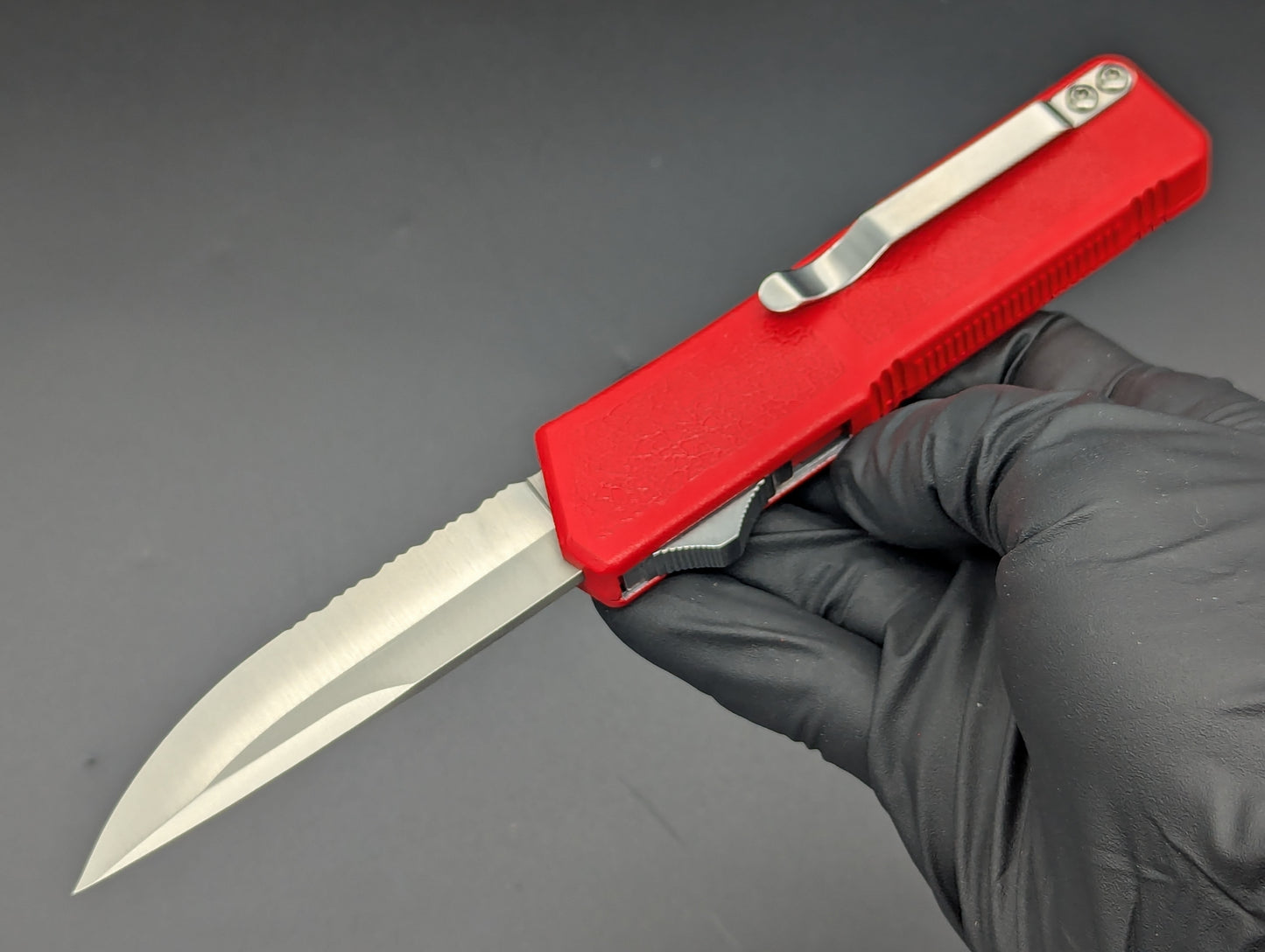 Lightning OTF Knife Red Part Serr. Drop Point