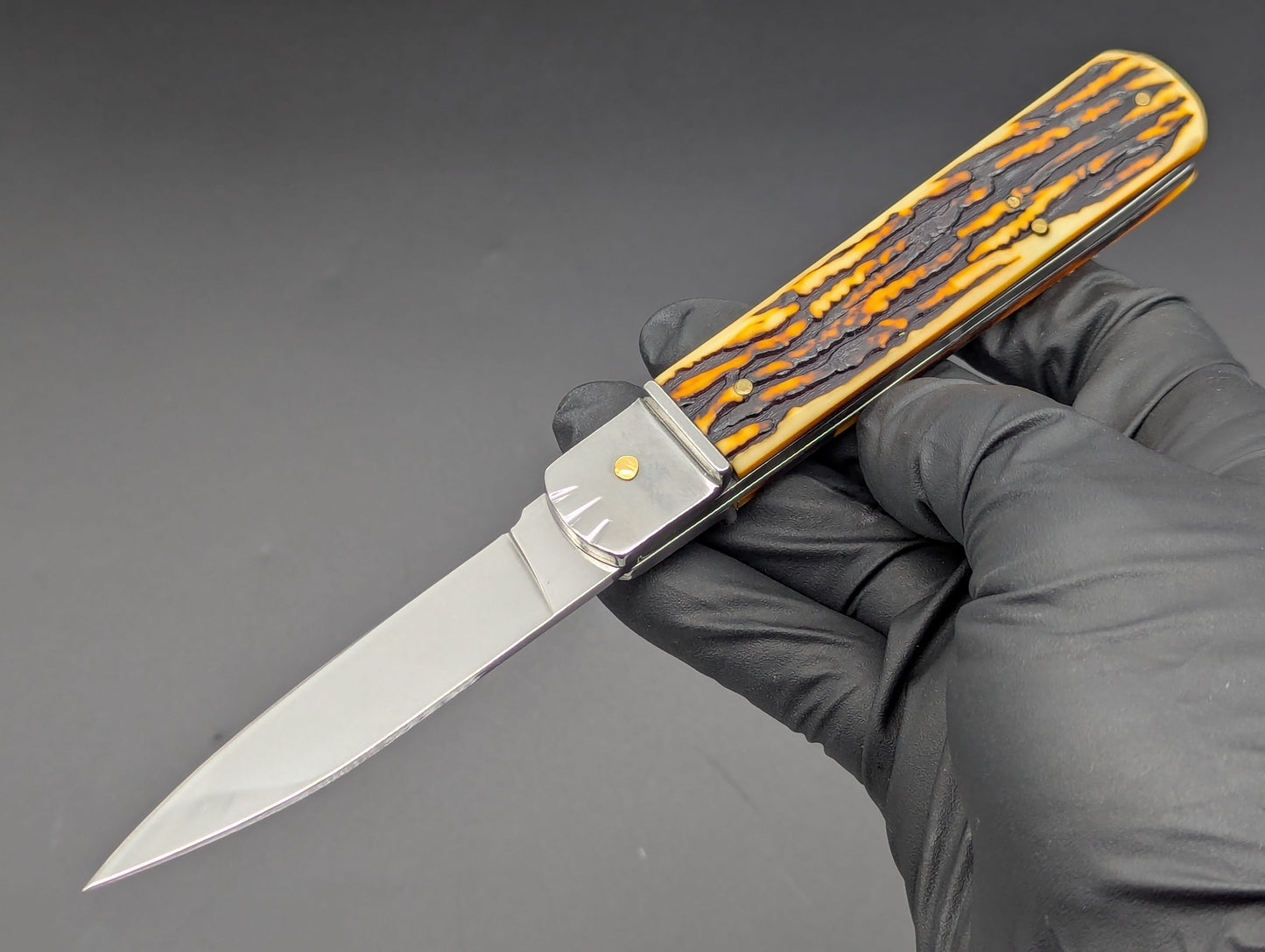 FAUX STAG 7.5" LEVERLOCK SWITCHBLADE KNIFE