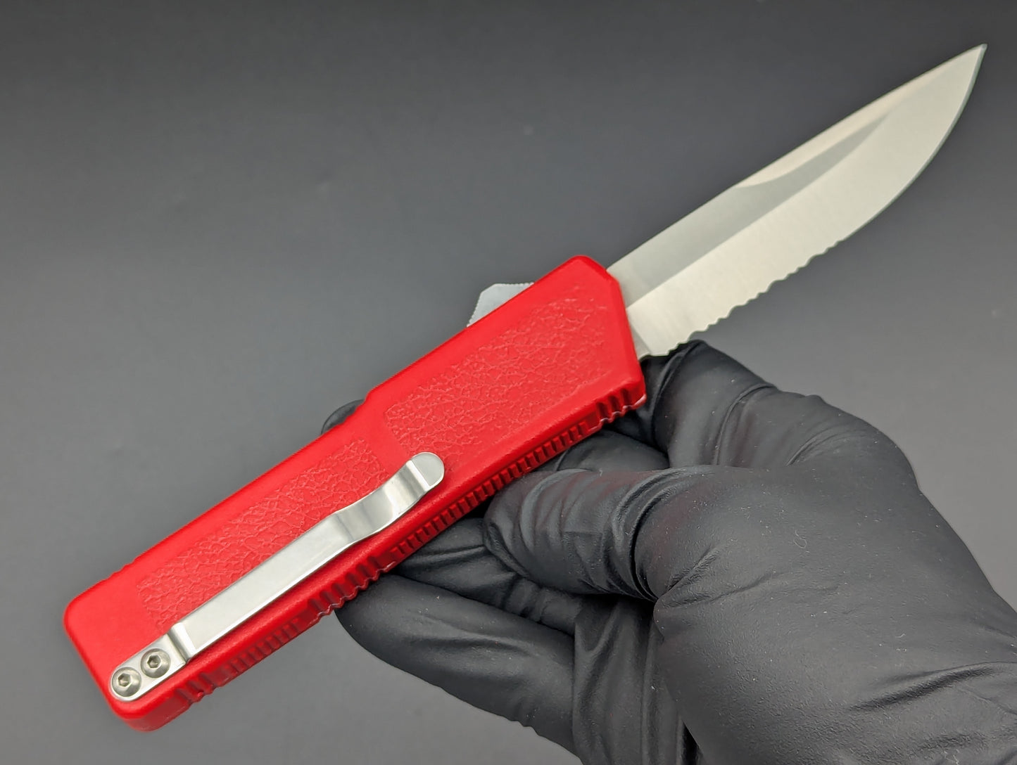 Lightning OTF Knife Red Part Serr. Drop Point