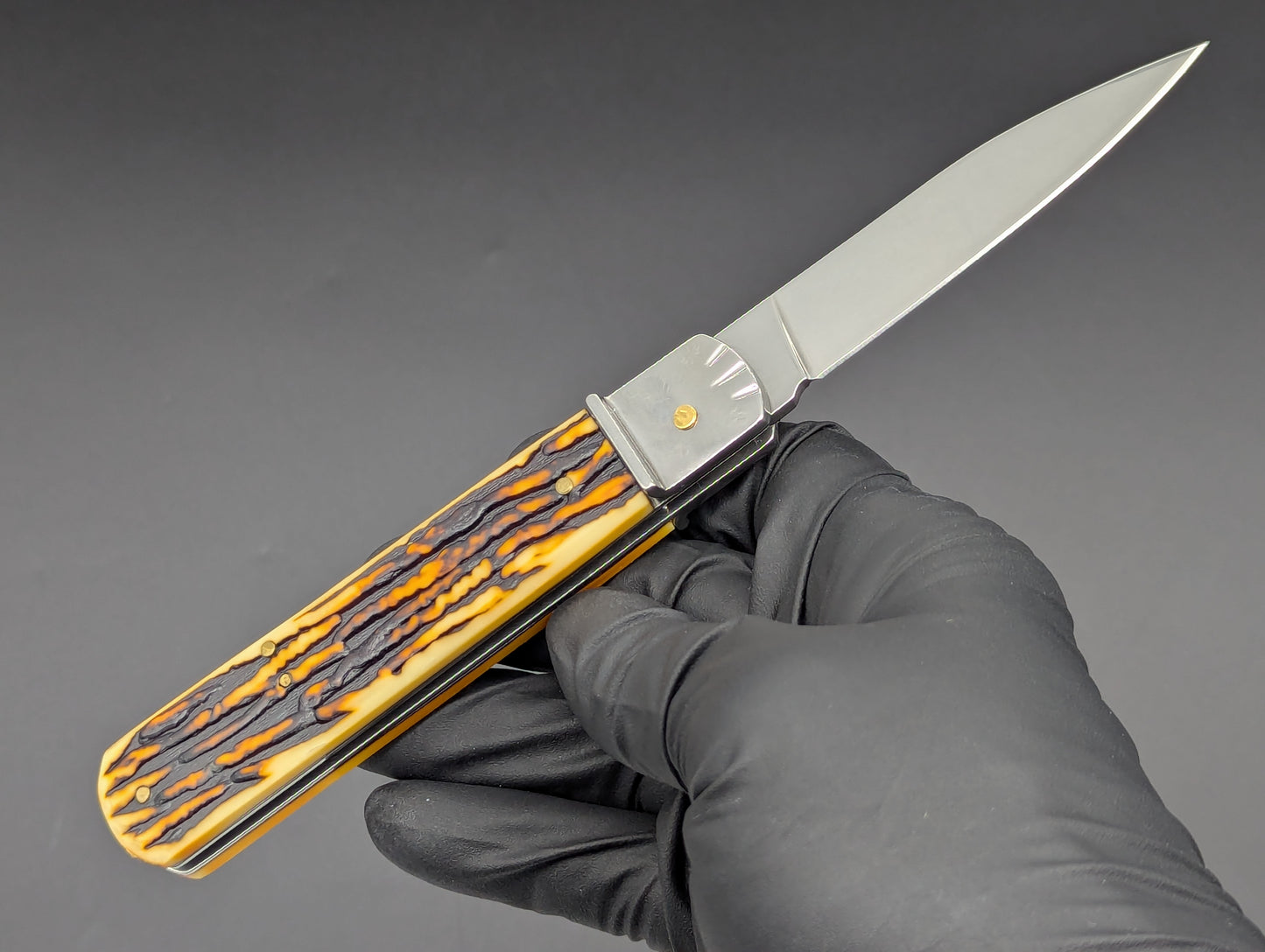 FAUX STAG 7.5" LEVERLOCK SWITCHBLADE KNIFE