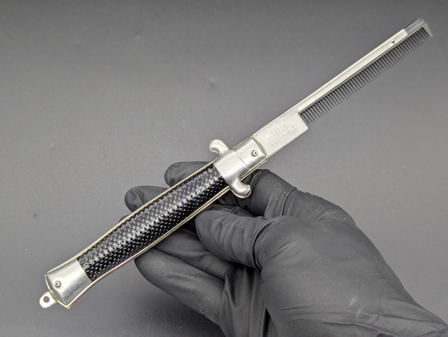 NOS 80's VINTAGE HONG KONG SWITCHBLADE COMB