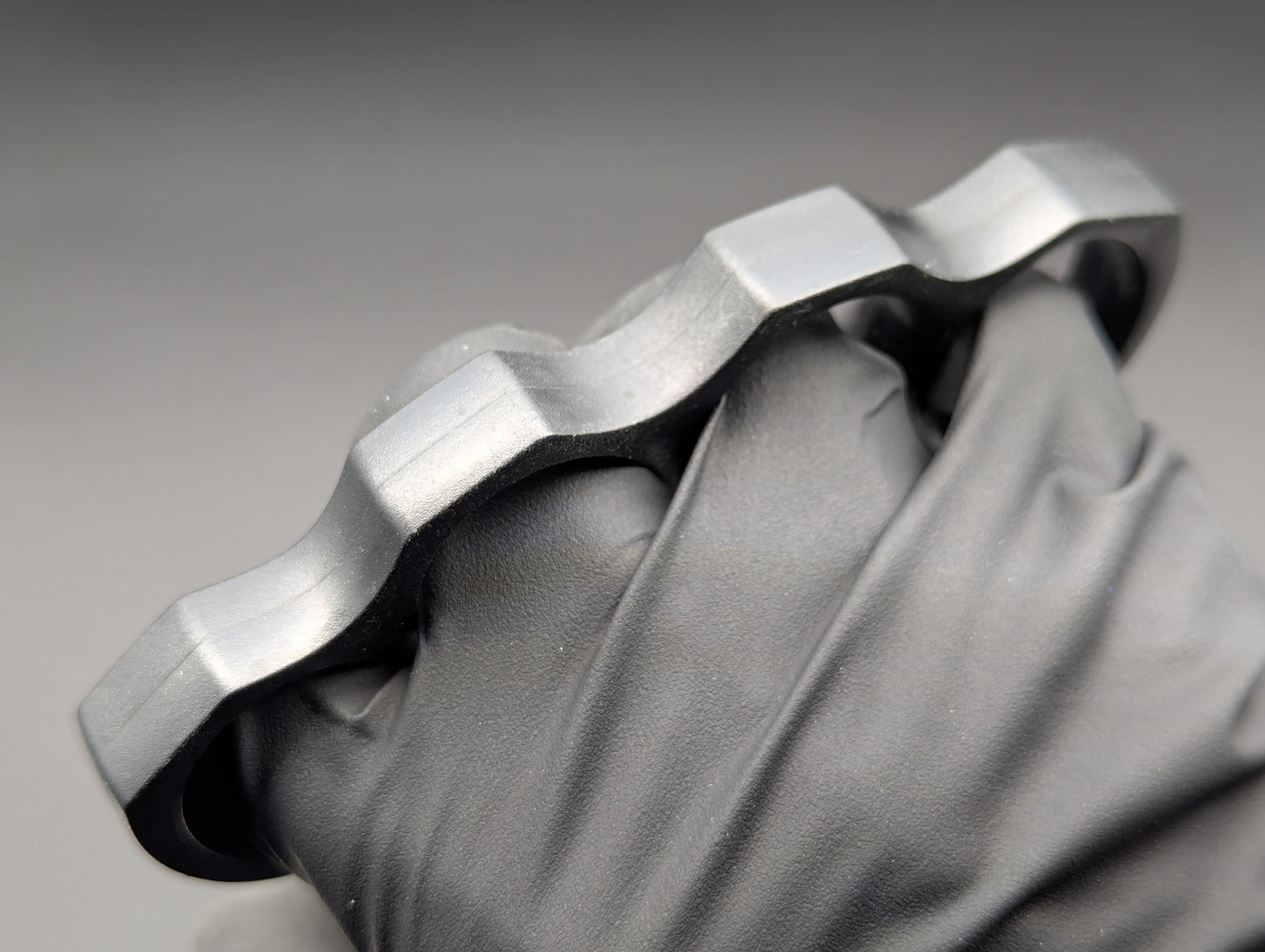 ABS PLASTIC NON PERMISSIVE ENVIRONMENT KNUCKLE DUSTERS BLACK