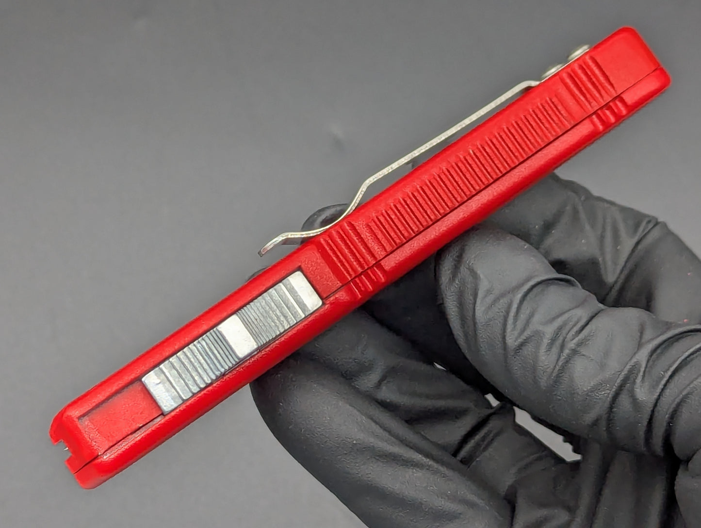 Lightning OTF Knife Red Part Serr. Drop Point