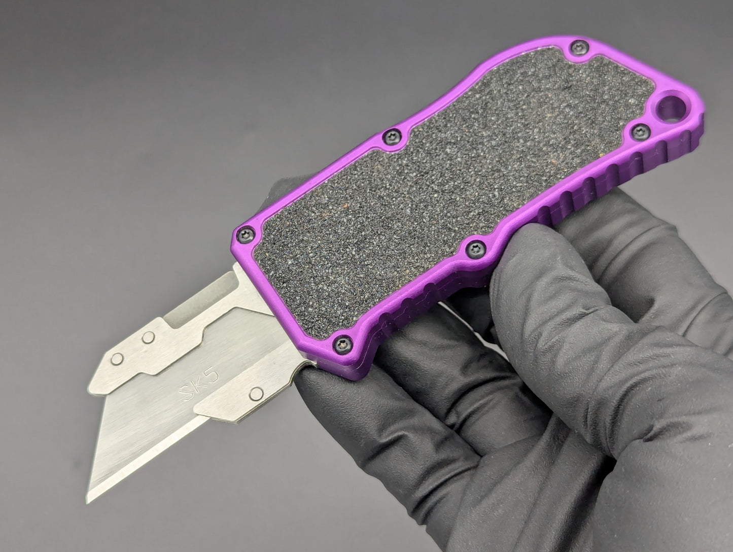 PURPLE DUAL ACTION OTF BOX CUTTER TEXTURED INLAY