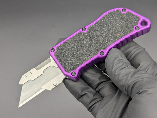 PURPLE DUAL ACTION OTF BOX CUTTER TEXTURED INLAY